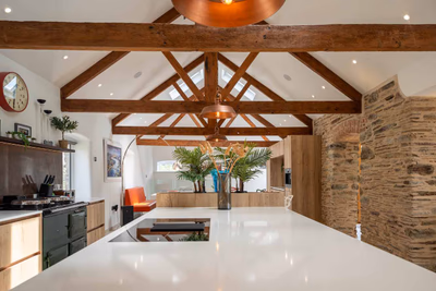 Kitchen island with copper pendant lights