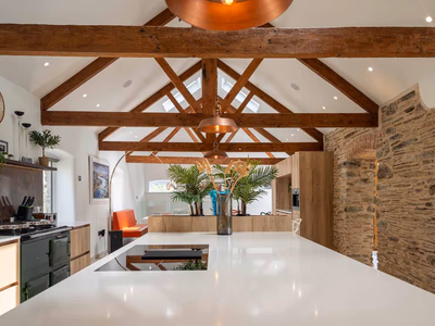 Kitchen island with copper pendant lights