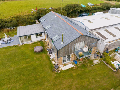 Coastal timber build with natural slate roof