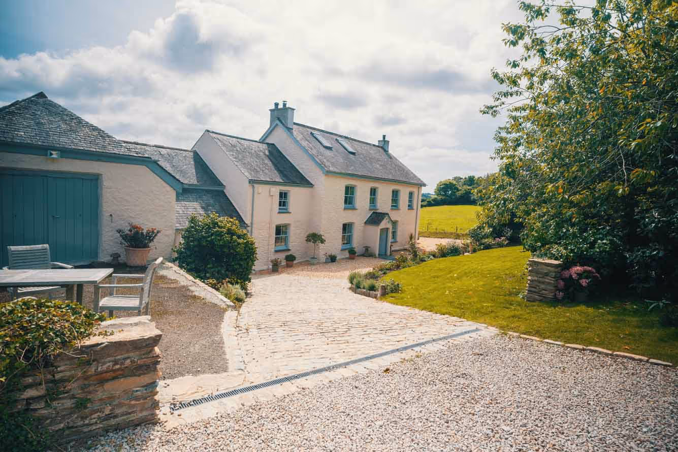 Modern Cornwall building on the Roseland Peninsula featuring traditional stone masonry and contemporary architectural design by Arron Bennett Building