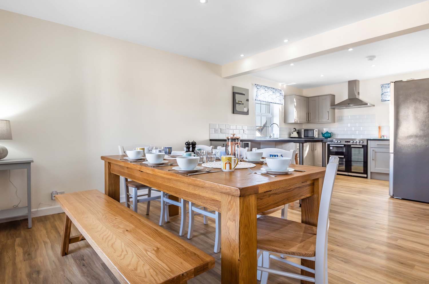 Open-plan kitchen diner with oak dining table
