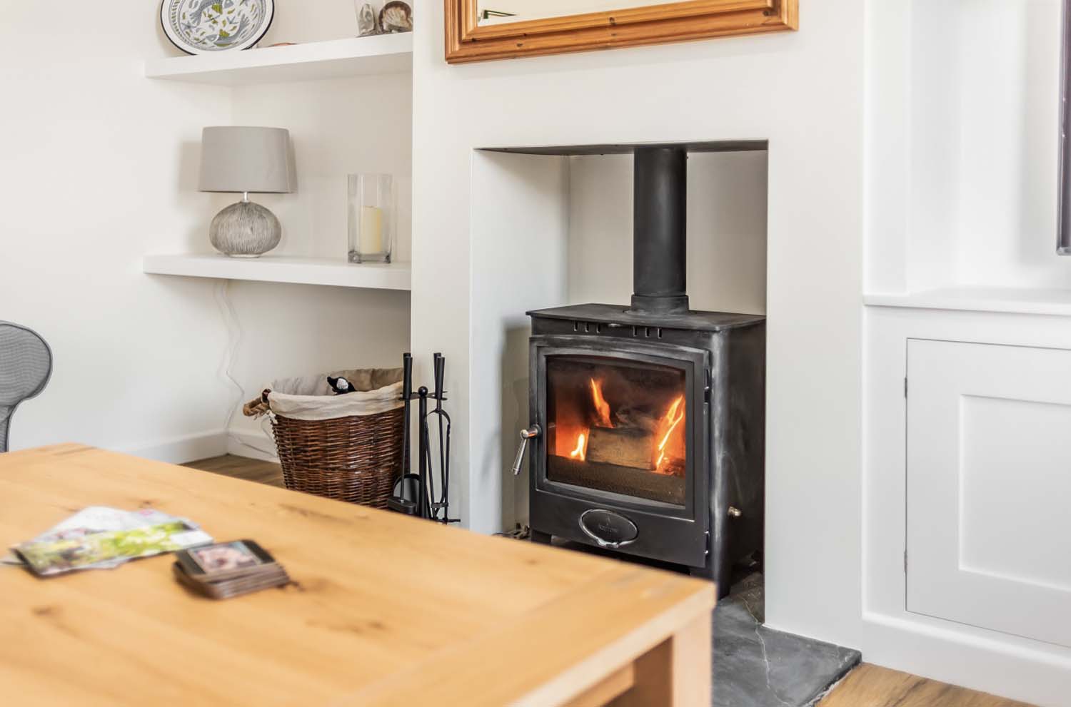 Grey shaker kitchen with white subway tiles and blue border